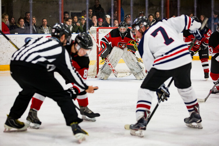 A hockey goalie waiting for the face-off - Tips for Editing Hockey Photos in Lightroom